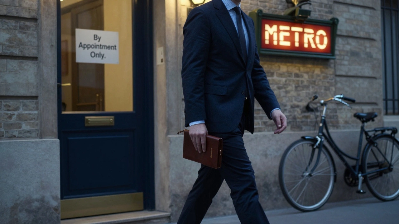 A person walking past a discreet door in a Paris alley at dusk, metro sign faintly visible in the background.